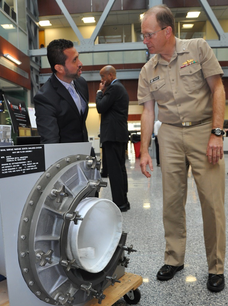 NSWCDD engineer Helmer Flores demonstrates how a shipboard Collective Protection System (CPS) fi ...